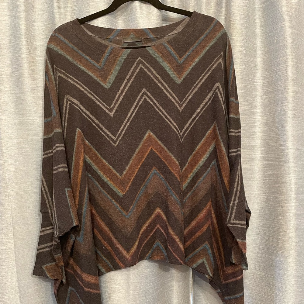 Nally and Millie geometric print poncho sweater